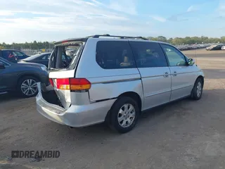 2003 Honda Odyssey EX-L with VIN 5FNRL18973B007802, listed as a IAAI auction lot 40365765 with 278,759 mi miles and . Bid and sale history available at DreamBid. Image 4.
