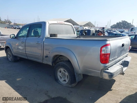 2005 Toyota Tundra SR5 with VIN 5TBET341X5S464119, listed as a IAAI auction lot 40121832 with 185,454 mi miles. Bid and sale history available at carsss.com. Image 3.