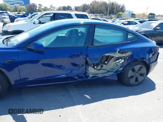 2023 Tesla Model 3 with VIN 5YJ3E1EA1PF431190, listed as a IAAI auction lot 41980007 with 26,164 mi miles and . Bid and sale history available at DreamBid. Image 6.