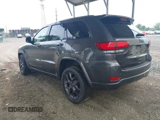 2021 Jeep Grand Cherokee 80th Anniversary with VIN 1C4RJFBG2MC612416, listed as a IAAI auction lot 42457040 with 35,441 mi miles and . Bid and sale history available at DreamBid. Image 3.