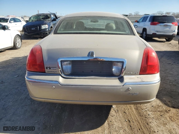 2005 Lincoln Town Car Signature Limited with VIN 1LNHM82W25Y656194, listed as a Copart auction lot 84109494 with 111,850 mi miles and Salvage Title. Bid and sale history available at carsss.com. Image 6.