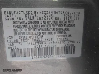 2015 Nissan Sentra S with VIN 3N1AB7AP0FY307561, listed as a IAAI auction lot 42090506 with 149,744 mi miles. Bid and sale history available at carsss.com. Image 9.