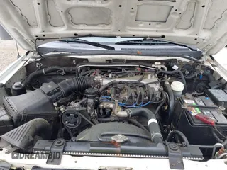 2003 Mitsubishi Montero Sport ES with VIN JA4LS21H43J034474, listed as a IAAI auction lot 41905405 with 194,514 mi miles. Bid and sale history available at carsss.com. Image 10.