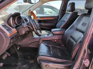 2012 Jeep Grand Cherokee Overland with VIN 1C4RJFCG5CC298516, listed as a Copart auction lot 53164465 with 232,575 mi miles and Clean Title. Bid and sale history available at carsss.com. Image 7.