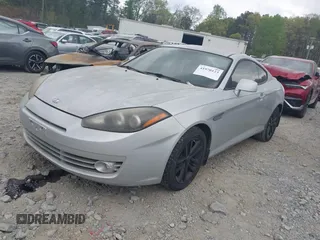 2008 Hyundai Tiburon GS z VIN KMHHM66D68U264666, wystawiony jako IAAI lot #41970123 z przebiegiem 186 448 mil mil oraz . Historia ofert i sprzedaży dostępna na DreamBid. Obrazek 2.