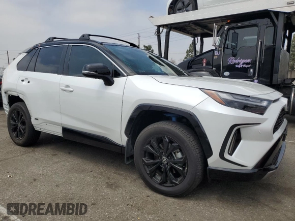 2024 Toyota RAV4 Hybrid XSE with VIN 4T3E6RFV0RU141591, listed as a Copart auction lot 59623085 with 27,682 mi miles and Salvage title. Bid and sale history available at DreamBid. Image 4.
