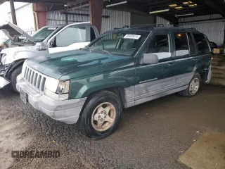 1997 Jeep Grand Cherokee TSi with VIN 1J4FX58S6VC602782, listed as a Copart auction lot 86605074 with 158,971 mi miles and Salvage Title. Bid and sale history available at carsss.com. Image 1.