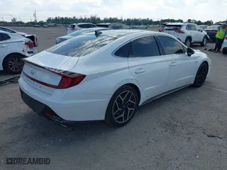 2021 Hyundai Sonata N Line with VIN 5NPEK4JC7MH125036, listed as a IAAI auction lot 41813459 with 32,131 mi miles. Bid and sale history available at carsss.com. Image 4.