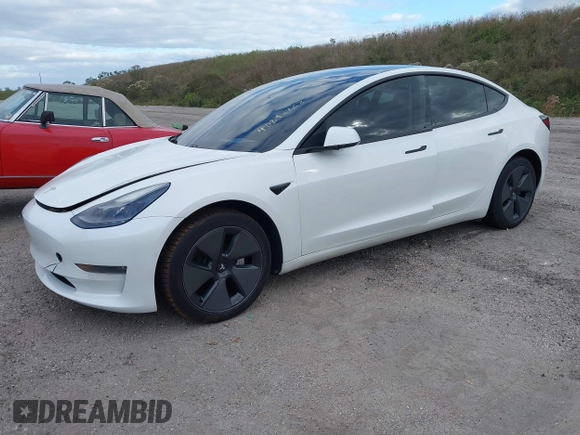 2021 Tesla Model 3 Long Range z VIN 5YJ3E1EB7MF979988, wystawiony jako IAAI lot #40893463 z przebiegiem 38 230 mil mil oraz . Historia ofert i sprzedaży dostępna na DreamBid. Obrazek 2.
