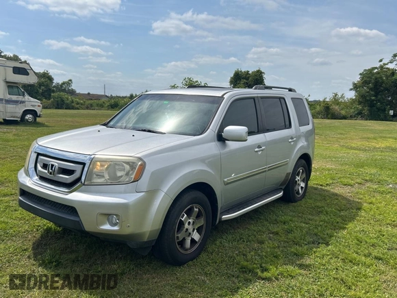 2010 Honda Pilot Touring with VIN 5FNYF3H86AB015716, listed as a Copart auction lot 54362235 with 229,256 mi miles and Clean Title. Bid and sale history available at carsss.com. Image 2.