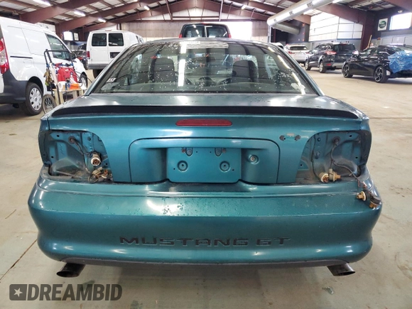 1996 Ford Mustang GT z VIN 1FALP42X5TF191769, wystawiony jako Copart lot #49364525 z przebiegiem 69 029 mil mil oraz Szkoda całkowita • Salvage title. Historia ofert i sprzedaży dostępna na DreamBid. Obrazek 6.