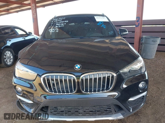 2018 BMW X1 sDrive28i z VIN WBXHU7C35J5L06673, wystawiony jako IAAI lot #42275787 z przebiegiem 61 204 mil mil oraz . Historia ofert i sprzedaży dostępna na DreamBid. Obrazek 12.