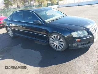 2006 Audi A8 4.2L z VIN WAUML44E96N013151, wystawiony jako IAAI lot #41821108 z przebiegiem 150 334 mil mil oraz . Historia ofert i sprzedaży dostępna na DreamBid. Obrazek 13.