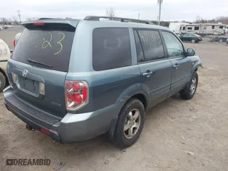 2006 Honda Pilot EX-L with RES with VIN 2HKYF18646H555514, listed as a IAAI auction lot 41703223 with 292,487 mi miles. Bid and sale history available at carsss.com. Image 4.