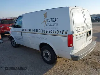1999 Chevrolet Astro Cargo with VIN 1GCDM19W4XB141901, listed as a IAAI auction lot 41572036 with Not Provided miles. Bid and sale history available at carsss.com. Image 3.