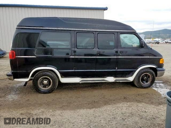 2000 Dodge Cargo Conversion with VIN 2B6HB11Y0YK148526, listed as a Copart auction lot 87270124 with 242,057 mi miles and Clean Title. Bid and sale history available at carsss.com. Image 9.