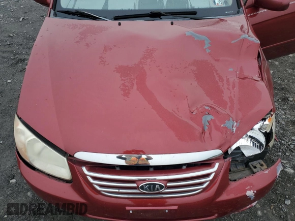 2007 Kia Spectra EX with VIN KNAFE121X75381938, listed as a Copart auction lot 74341004 with 118,890 mi miles and Salvage Title. Bid and sale history available at carsss.com. Image 11.