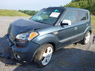 2010 Kia Soul + with VIN KNDJT2A23A7069815, listed as a IAAI auction lot 40173837 with 116,028 mi miles. Bid and sale history available at carsss.com. Image 2.