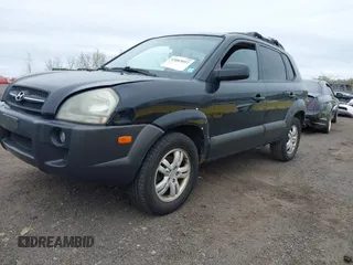 2007 Hyundai Tucson SE with VIN KM8JN12D77U667867, listed as a IAAI auction lot 42082092 with 240,911 mi miles. Bid and sale history available at carsss.com. Image 2.