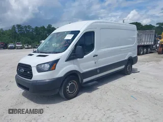2019 Ford Transit z VIN 1FTYR2CM9KKB07381, wystawiony jako IAAI lot #42506233 z przebiegiem 96 311 mil mil oraz . Historia ofert i sprzedaży dostępna na DreamBid. Obrazek 2.