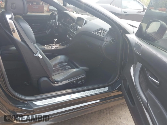 2014 BMW M6 z VIN WBSLZ9C5XEDZ78402, wystawiony jako IAAI lot #42399055 z przebiegiem 127 803 mil mil oraz . Historia ofert i sprzedaży dostępna na DreamBid. Obrazek 5.