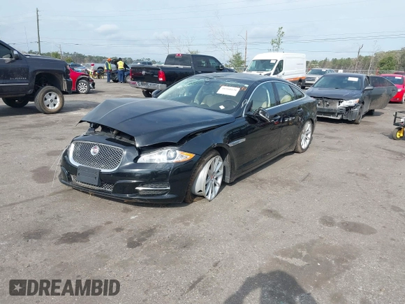 2015 Jaguar XJ with VIN SAJWA1CZ9F8V78228, listed as a IAAI auction lot 41260138 with 52,622 mi miles. Bid and sale history available at carsss.com. Image 17.