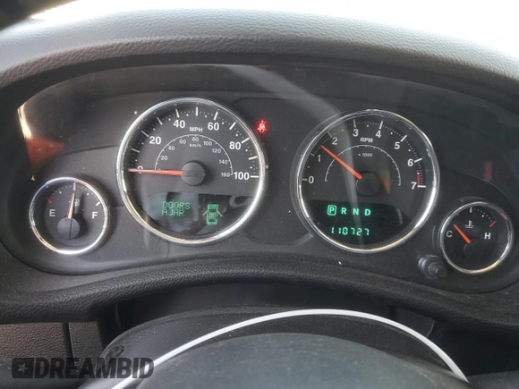 2013 Jeep Wrangler Sahara with VIN 1C4AJWBG8DL602065, listed as a Copart auction lot 52082535 with 110,727 mi miles and Salvage title. Bid and sale history available at DreamBid. Image 9.