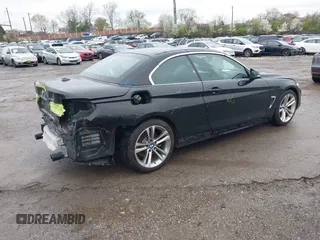 2015 BMW 4 Series 435i with VIN WBA3T3C57FP738517, listed as a IAAI auction lot 41975696 with 61,140 mi miles and . Bid and sale history available at carsss.com. Image 4.
