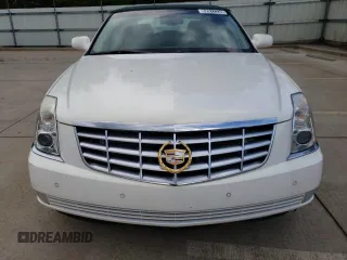 2006 Cadillac DTS 1SD z VIN 1G6KD57Y86U146074, wystawiony jako Copart lot #52917235 z przebiegiem 133 956 mil mil oraz Tytuł czysty. Historia ofert i sprzedaży dostępna na DreamBid. Obrazek 5.