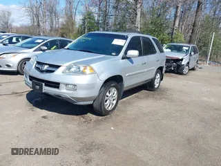 2005 Acura MDX Touring with VIN 2HNYD18945H517671, listed as a IAAI auction lot 41889240 with 275,116 mi miles. Bid and sale history available at carsss.com. Image 2.