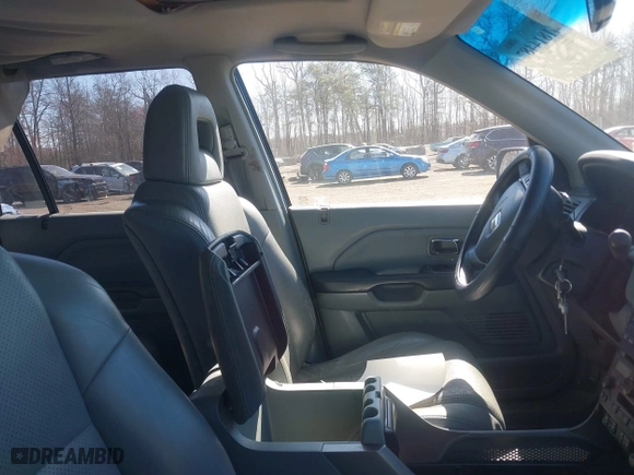 2005 Honda Pilot EX-L with NAVI with VIN 2HKYF18705H559938, listed as a IAAI auction lot 41814487 with 188,665 mi miles. Bid and sale history available at carsss.com. Image 5.