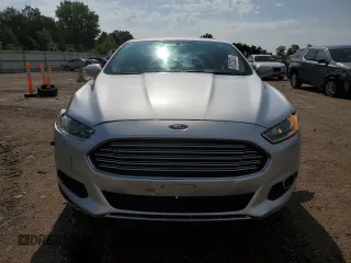 2016 Ford Fusion SE z VIN 3FA6P0HDXGR369218, wystawiony jako Copart lot #61225875 z przebiegiem 176 559 mil mil oraz Szkoda całkowita • Salvage title. Historia ofert i sprzedaży dostępna na DreamBid. Obrazek 5.