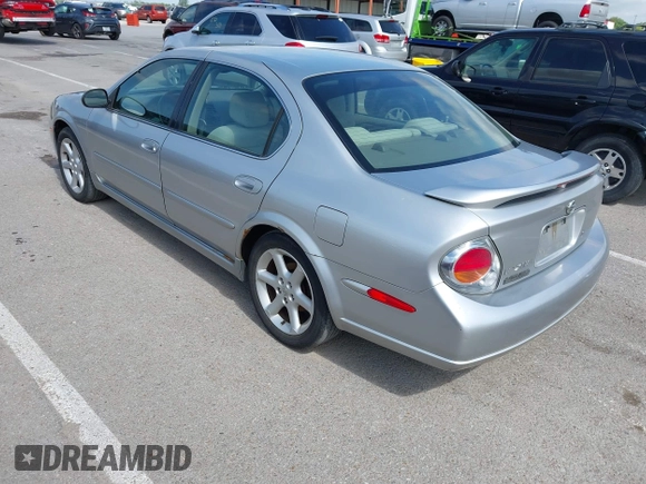 2003 Nissan Maxima SE with VIN JN1DA31D33T513282, listed as a IAAI auction lot 42289710 with 343,973 mi miles and . Bid and sale history available at DreamBid. Image 3.