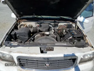 1999 Cadillac Escalade z VIN 1GYEK13R8XR411548, wystawiony jako Copart lot #75803424 z przebiegiem 277 712 mil mil oraz Szkody całkowita. Historia ofert i sprzedaży dostępna na DreamBid. Obrazek 13.