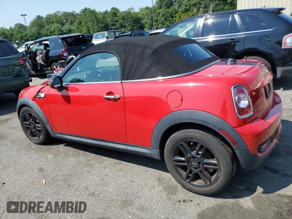 2013 MINI Roadster S z VIN WMWSY3C58DT594039, wystawiony jako Copart lot #65833804 z przebiegiem Nie podano mil oraz Szkody całkowita. Historia ofert i sprzedaży dostępna na DreamBid. Obrazek 2.