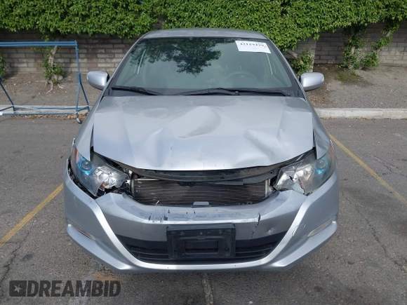 2010 Honda Insight EX with VIN JHMZE2H75AS003695, listed as a IAAI auction lot 42119429 with 90,901 mi miles and . Bid and sale history available at DreamBid. Image 12.
