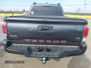 2021 Toyota Tacoma 4WD SR5 with VIN 3TMDZ5BN5MM110218, listed as a IAAI auction lot 41430303 with 47,781 mi miles. Bid and sale history available at carsss.com. Image 16.