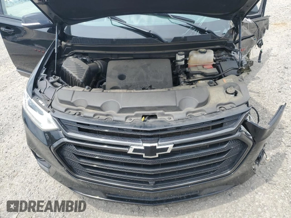 2021 Chevrolet Traverse Premier with VIN 1GNERKKW2MJ262862, listed as a Copart auction lot 58779765 with 76,927 mi miles and Salvage title. Bid and sale history available at DreamBid. Image 12.