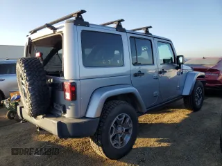 2013 Jeep Wrangler Unlimited Rubicon with VIN 1C4BJWFGXDL556365, listed as a Copart auction lot 88906315 with 113,880 mi miles and Salvage Title. Bid and sale history available at carsss.com. Image 3.