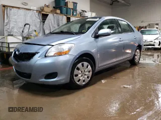 2010 Toyota Yaris with VIN JTDBT4K35A4064446, listed as a Copart auction lot 52099855 with 61,934 mi miles and Salvage Title. Bid and sale history available at carsss.com. Image 1.