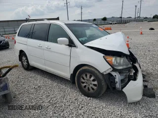 2010 Honda Odyssey EX with VIN 5FNRL3H48AB077659, listed as a Copart auction lot 62373835 with Not provided miles and Salvage title. Bid and sale history available at DreamBid. Image 4.