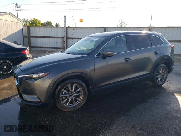 2021 Mazda CX-9 Sport with VIN JM3TCBBY5M0502888, listed as a Copart auction lot 61299673 with 50,576 mi miles and . Bid and sale history available at DreamBid. Image 1.