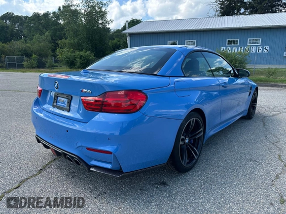2015 BMW M4 with VIN WBS3U9C56FP967640, listed as a Copart auction lot 63641785 with 31,516 mi miles and Salvage title. Bid and sale history available at DreamBid. Image 4.