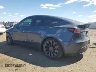 2023 Tesla Model Y Performance with VIN 7SAYGDEF3PF946496, listed as a Copart auction lot 50800315 with 15,077 mi miles and Salvage Title. Bid and sale history available at DreamBid. Image 2.