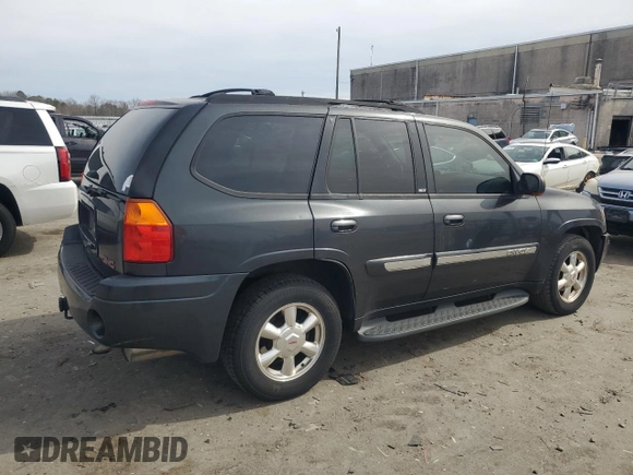 2003 GMC Envoy SLT with VIN 1GKDT13S232107429, listed as a Copart auction lot 48615135 with 245,956 mi miles and Clean Title. Bid and sale history available at carsss.com. Image 3.