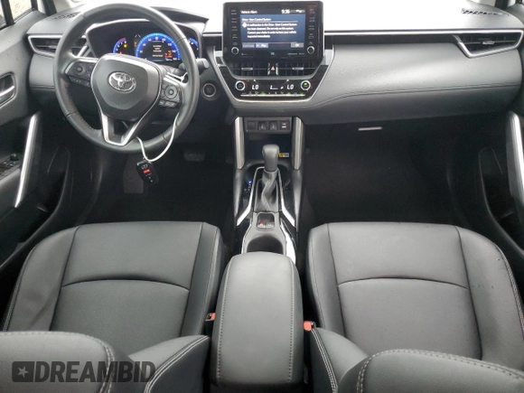 2022 Toyota Corolla Cross XLE с VIN 7MUDAAAG0NV006925, выставлен на аукционе Copart как лот 57719495 с пробегом 38 973 миль миль и Списание • Salvage title. История ставок и продаж доступна на DreamBid. Изображение 8.