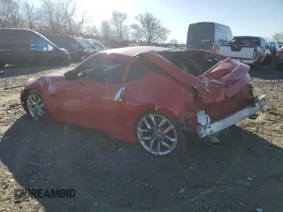 2014 Nissan 370Z Nismo with VIN JN1AZ4EH7EM630228, listed as a Copart auction lot 87024444 with 88,456 mi miles and Salvage title. Bid and sale history available at DreamBid. Image 2.