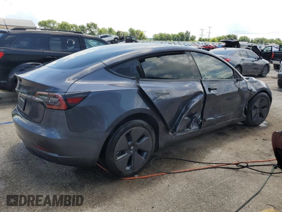 2023 Tesla Model 3 with VIN 5YJ3E1EA4PF614129, listed as a Copart auction lot 62019385 with 23,218 mi miles and Salvage title. Bid and sale history available at DreamBid. Image 3.