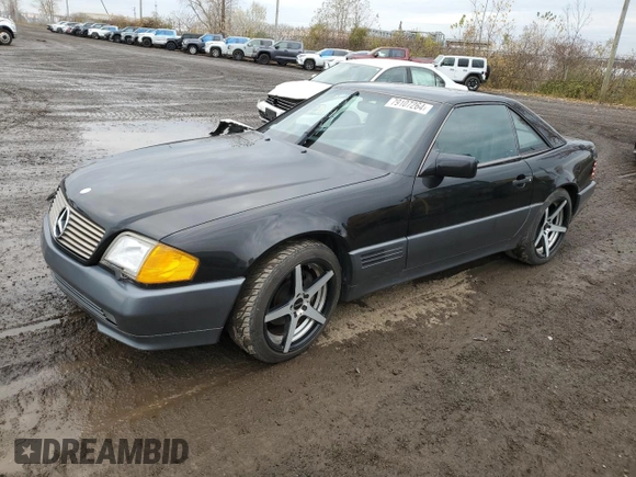 1994 Mercedes-Benz SL 5.0L with VIN WDBFA67E3RF102932, listed as a Copart auction lot 79107264 with 149,344 mi miles and Salvage title. Bid and sale history available at DreamBid. Image 1.