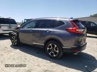 2017 Honda CR-V Touring with VIN 2HKRW2H96HH612495, listed as a Copart auction lot 54195655 with 66,968 mi miles and Salvage Title. Bid and sale history available at DreamBid. Image 2.
